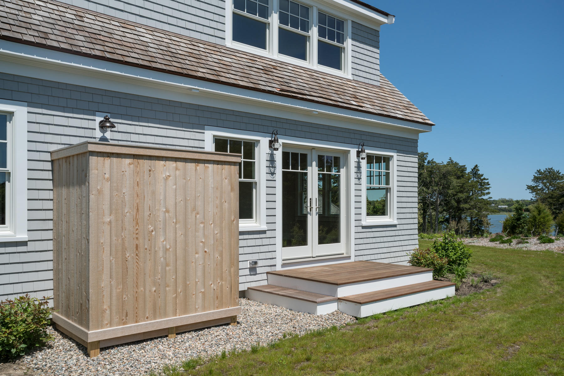 43 Payson Lane Orleans, MA 02653 - Photo 30 of 34 a view of a house with a yard and stairs