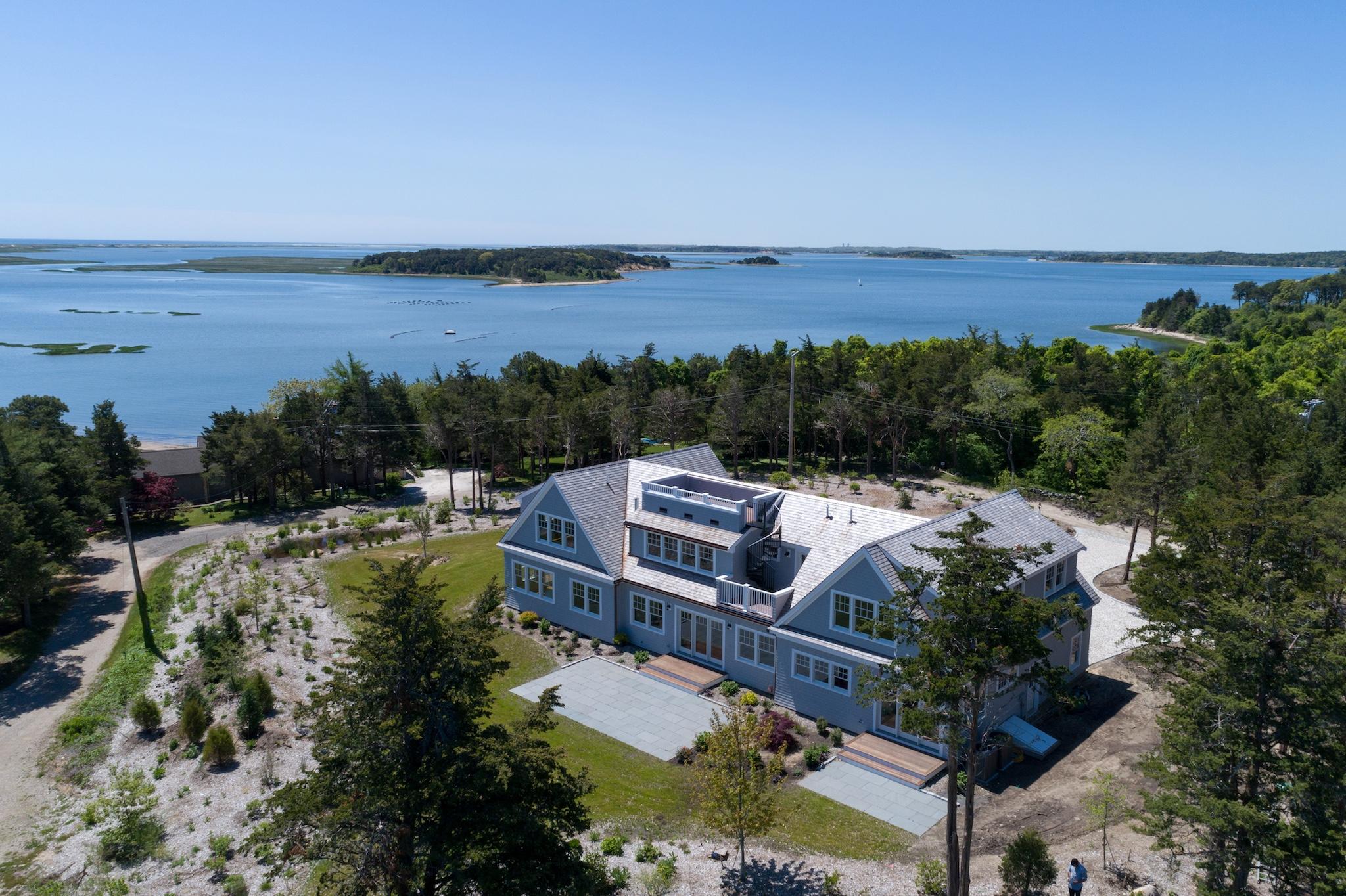 43 Payson Lane Orleans, MA 02653 - Photo 3 of 34 an aerial view of a house with a garden