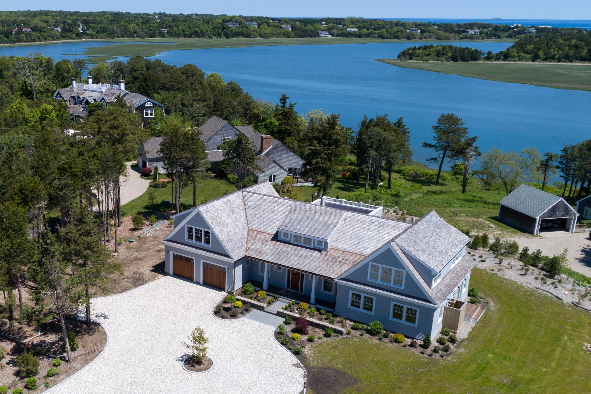 43 Payson Lane Orleans, MA 02653 - Photo 31 of 34 an aerial view of a house with outdoor space and lake view