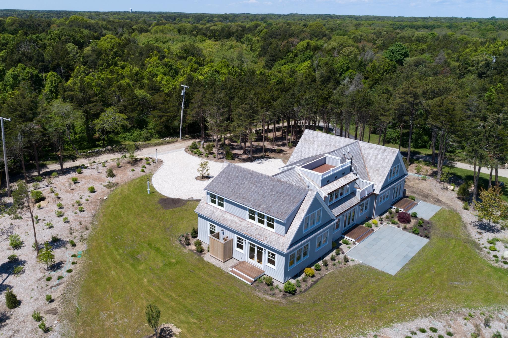 43 Payson Lane Orleans, MA 02653 - Photo 32 of 34 an aerial view of a house with a big yard