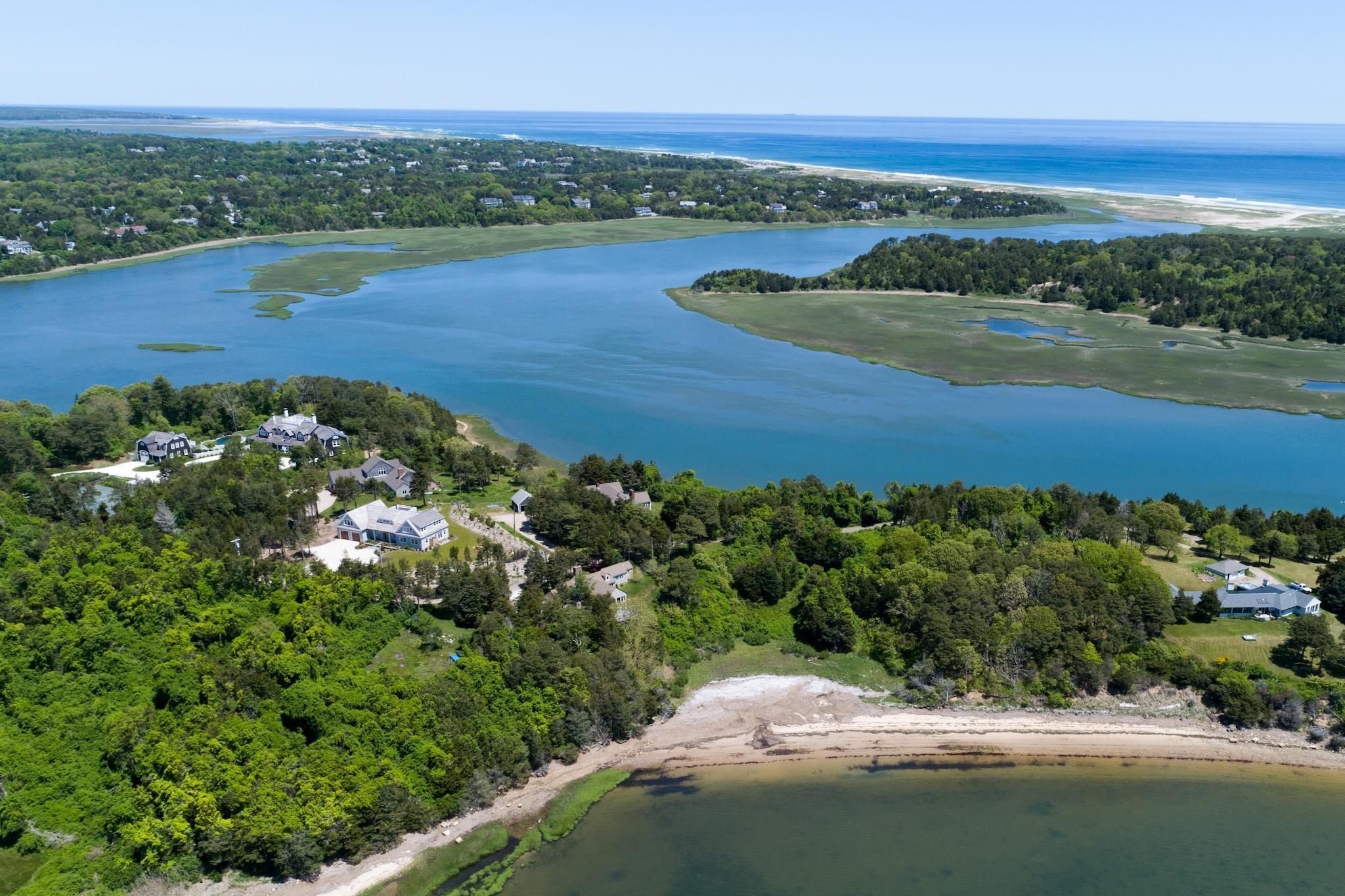 43 Payson Lane Orleans, MA 02653 - Photo 34 of 34 an aerial view of residential houses with outdoor space and trees