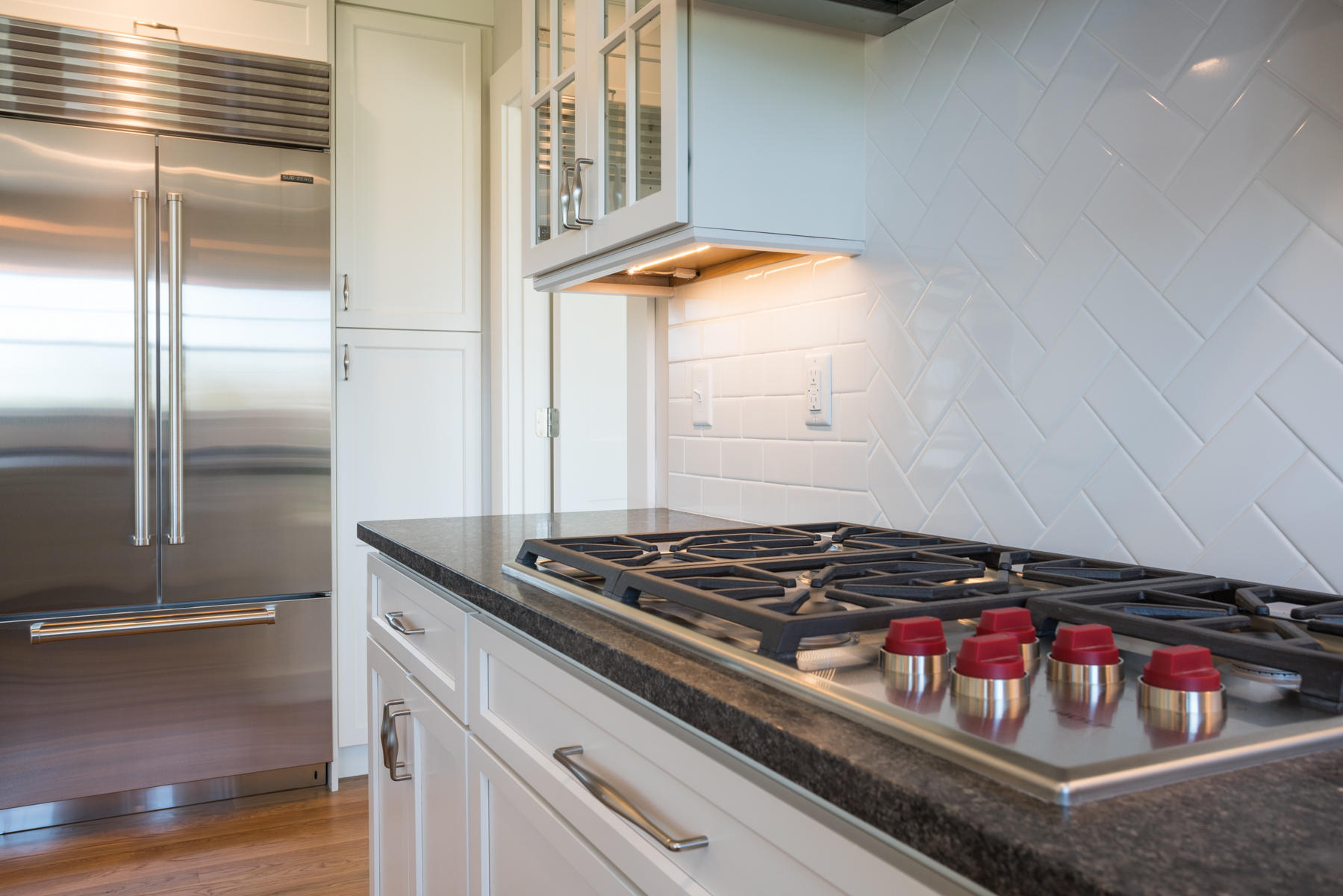 43 Payson Lane Orleans, MA 02653 - Photo 7 of 34 a kitchen with stainless steel appliances granite countertop a stove and a refrigerator