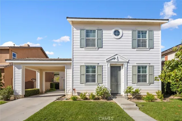 front view of a house with a yard