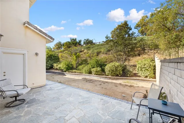 a view of a back yard of the house
