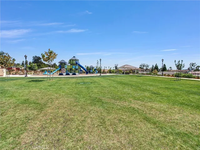an outdoor space with patio furniture with umbrella