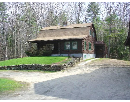 470 Athol Road Warwick, MA 01378 - Photo 1 of 1 a front view of a house with a yard and garage