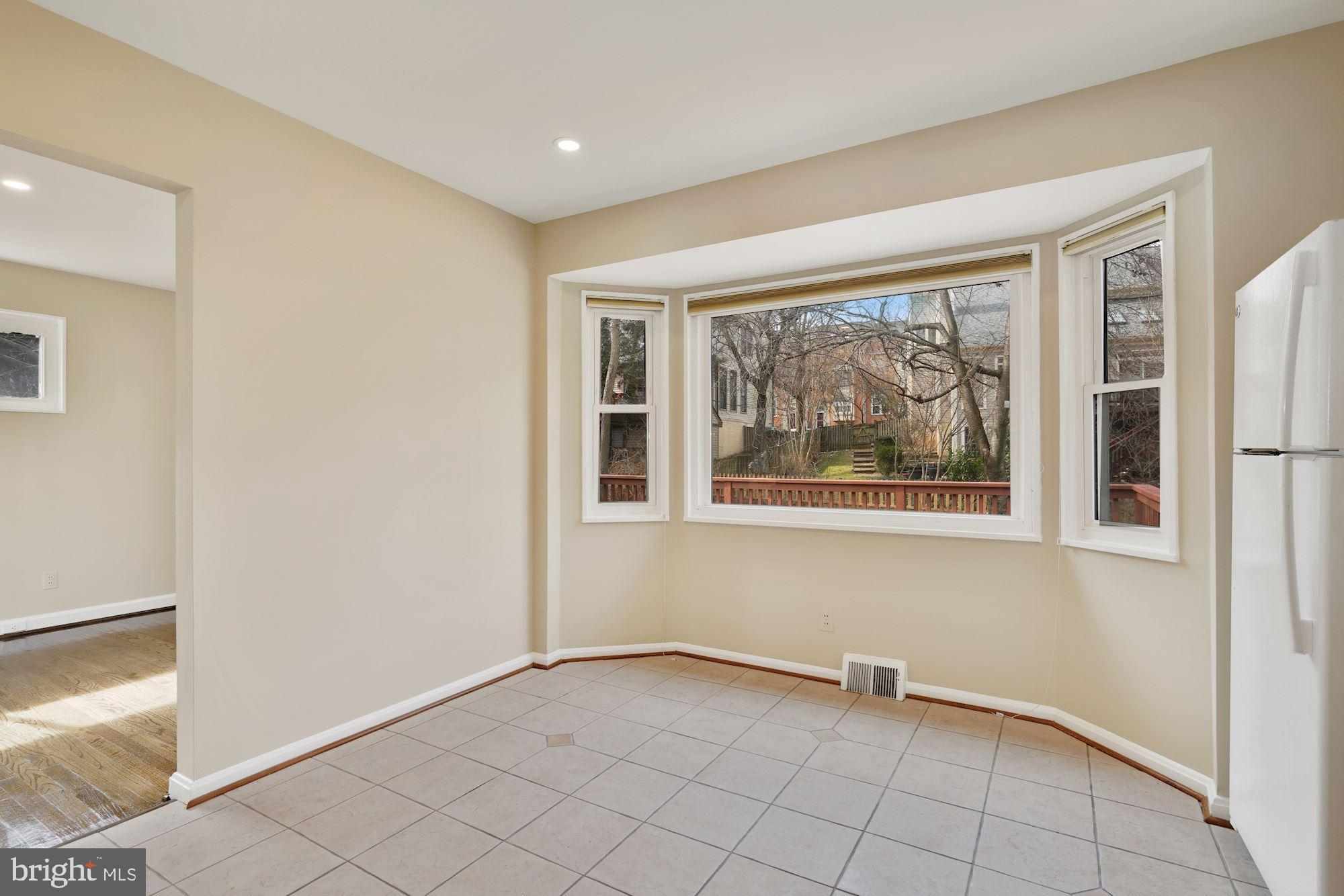 1821 Reedie Drive Silver Spring, MD 20902 - Photo 11 of 28 Breakfast nook w/large bay picture windows