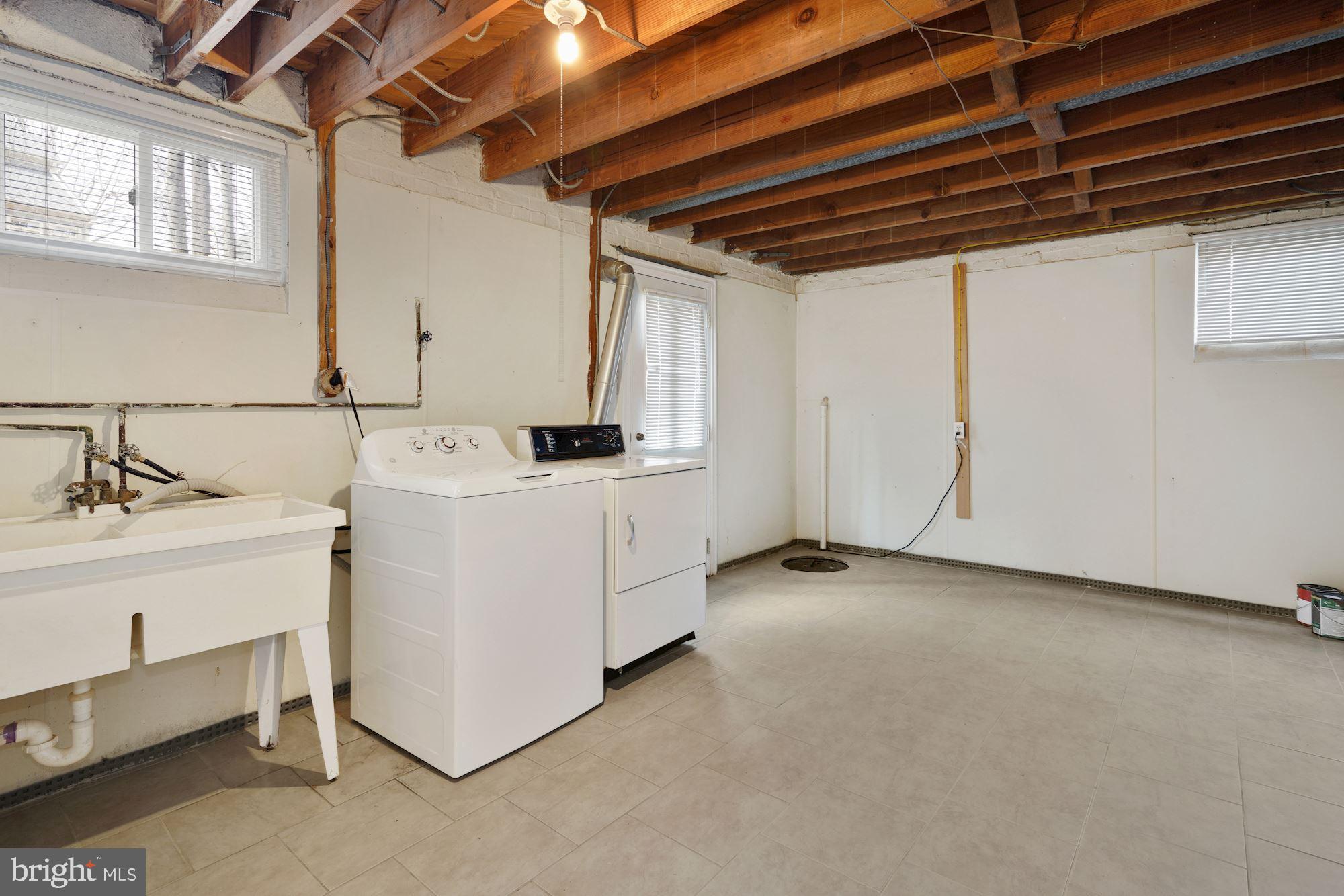 1821 Reedie Drive Silver Spring, MD 20902 - Photo 24 of 28 Laundry in an over-sized storage room
