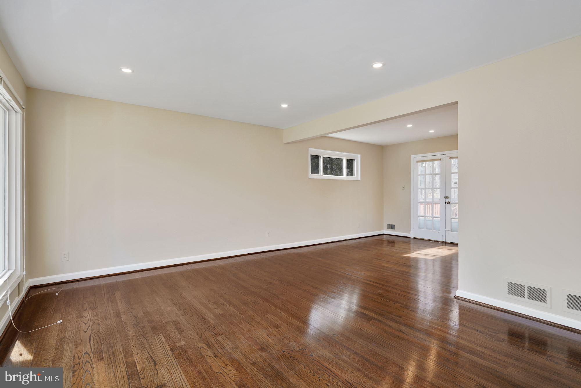 1821 Reedie Drive Silver Spring, MD 20902 - Photo 7 of 28 Living Room opens to Dining Room