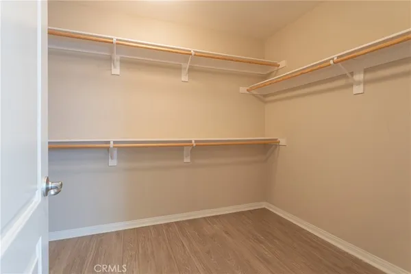 a view of an empty walk in closet