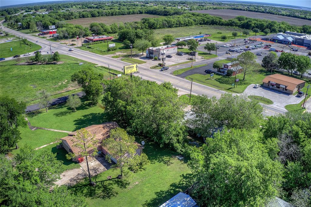 8782 Highway 34 Quinlan, TX 75474 - Photo 34 of 37 an aerial view of a houses with outdoor space and street view