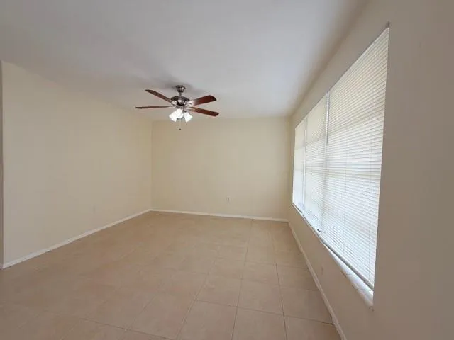a kitchen with stainless steel appliances a refrigerator sink and cabinets