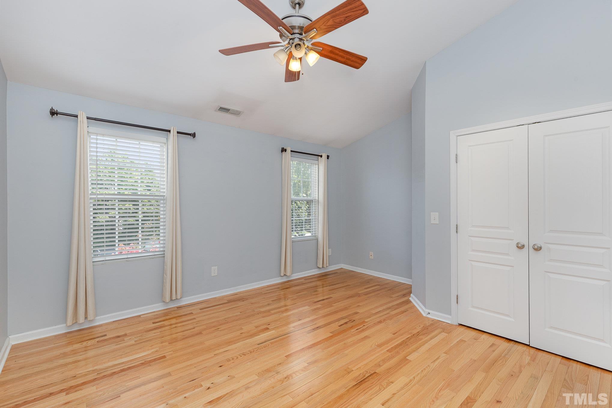 800 Bryant Street Raleigh, NC 27603 - Photo 11 of 20 a bedroom with a bed and a window