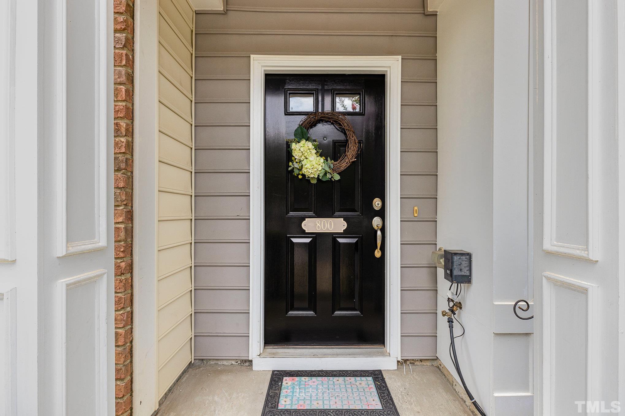 800 Bryant Street Raleigh, NC 27603 - Photo 3 of 20 a door view with a glass door