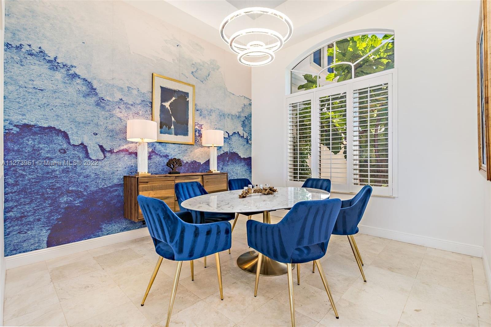 9460 Southeast Point Terrace Jupiter, FL 33469 - Photo 16 of 51 a dining room with furniture and window