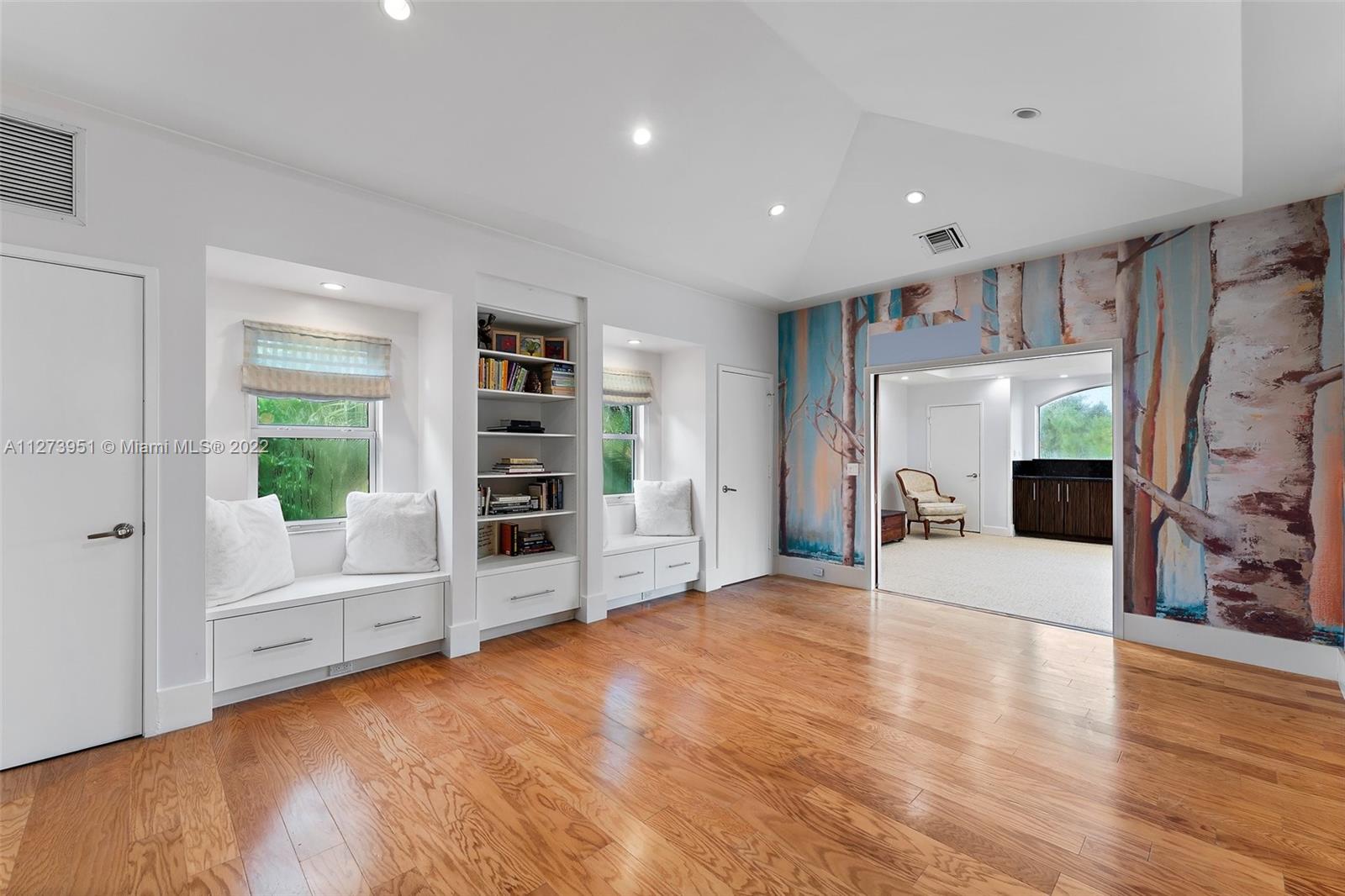 9460 Southeast Point Terrace Jupiter, FL 33469 - Photo 27 of 51 a view of an empty room with a window and fire place