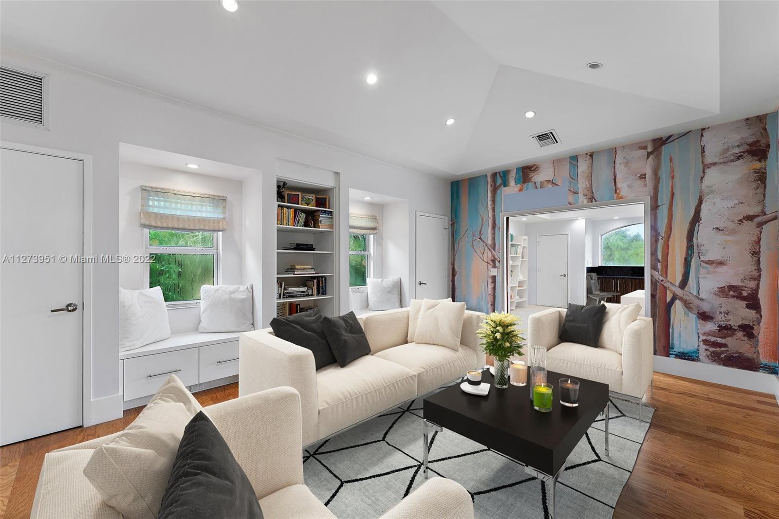 9460 Southeast Point Terrace Jupiter, FL 33469 - Photo 28 of 51 a living room with furniture and a large window