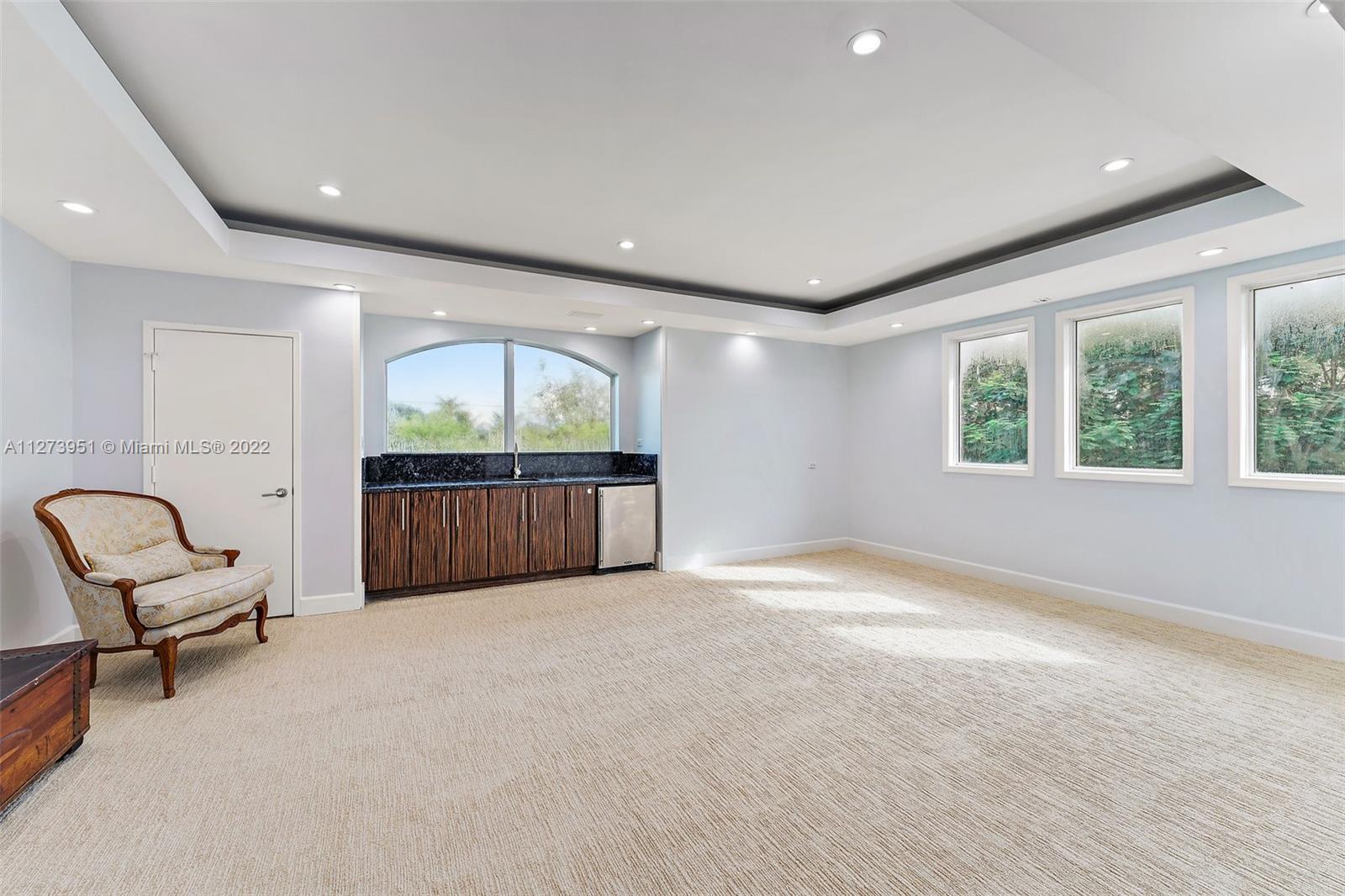 9460 Southeast Point Terrace Jupiter, FL 33469 - Photo 30 of 51 a view of an empty room with a window