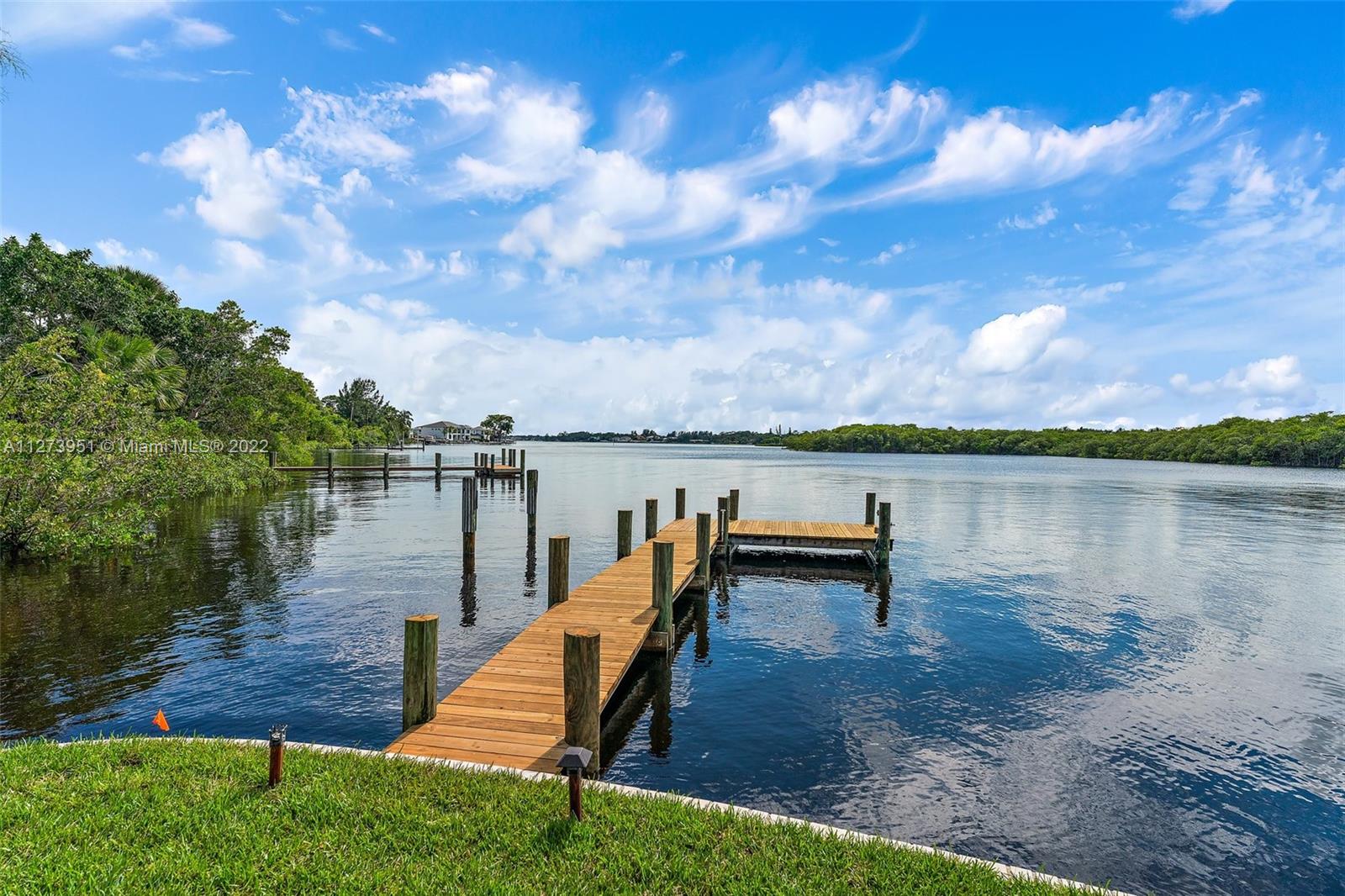 9460 Southeast Point Terrace Jupiter, FL 33469 - Photo 39 of 51 a view of a lake with outdoor space