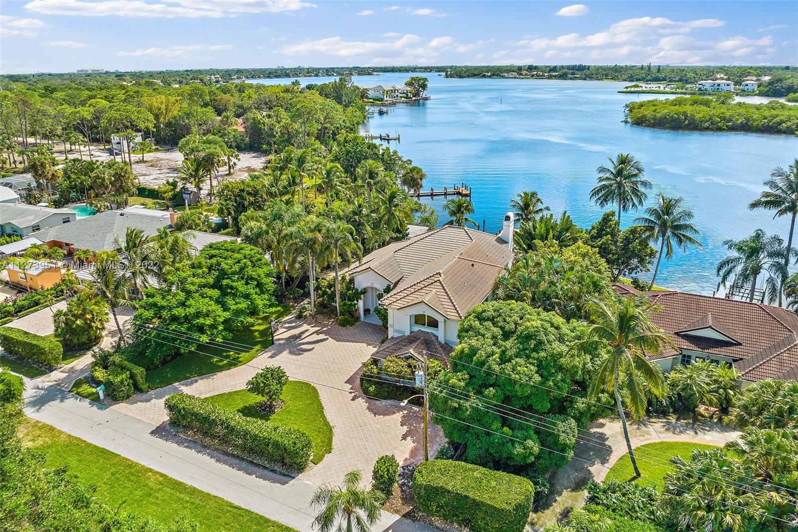 9460 Southeast Point Terrace Jupiter, FL 33469 - Photo 44 of 51 an aerial view of residential house with outdoor space and lake view