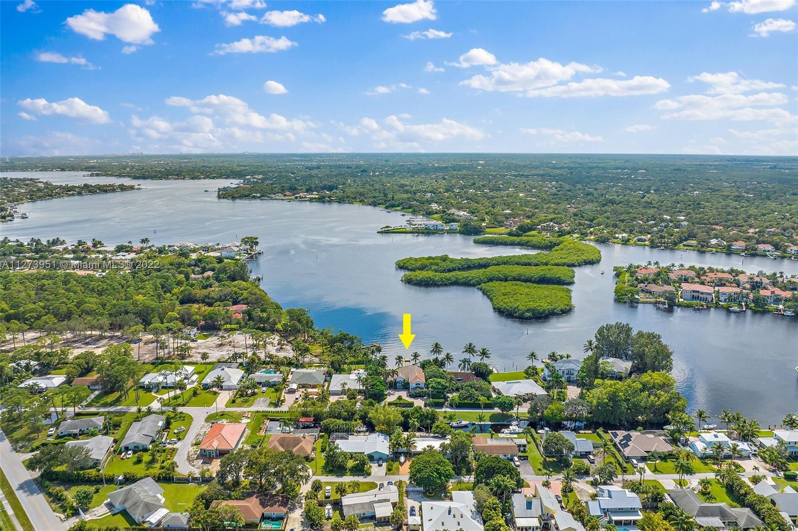 9460 Southeast Point Terrace Jupiter, FL 33469 - Photo 48 of 51 a view of a lake with a lake