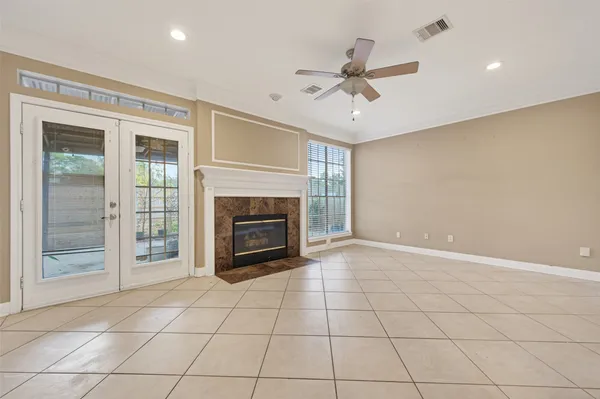 a view of an empty room with a fireplace