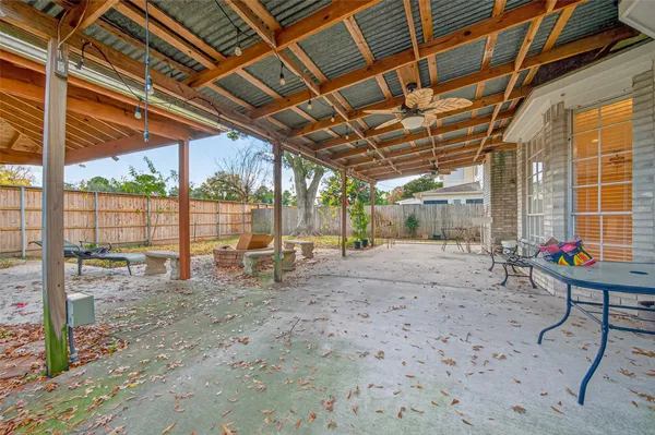 a view of swimming pool with outdoor seating
