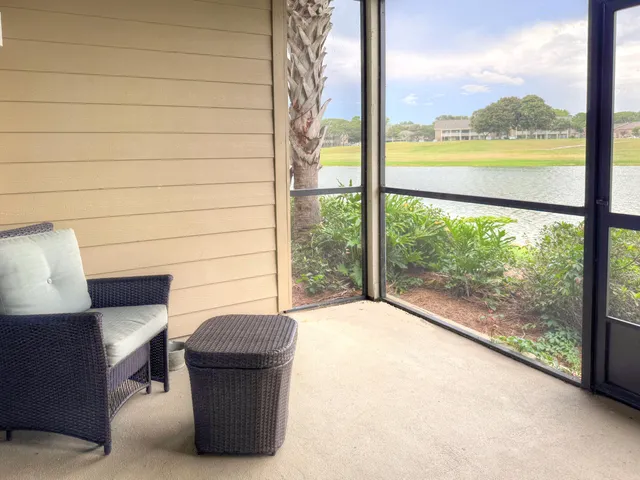 a view of a couch in front of a window