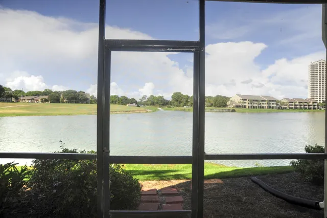 a view of a lake from a balcony