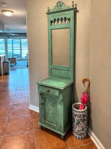 a dining room with a table and chairs