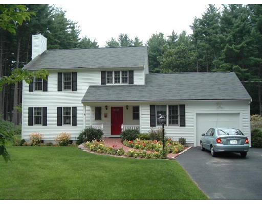 24 Old Stow Road Hudson, MA 01749 - Photo 1 of 15 a house view with a garden space