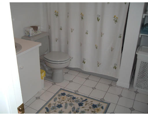 24 Old Stow Road Hudson, MA 01749 - Photo 11 of 15 a bathroom with a toilet and a shower
