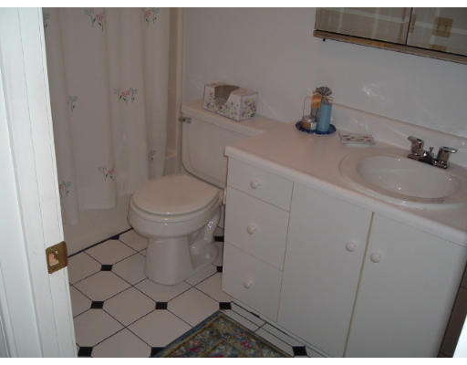 24 Old Stow Road Hudson, MA 01749 - Photo 14 of 15 a bathroom with a sink and toilet