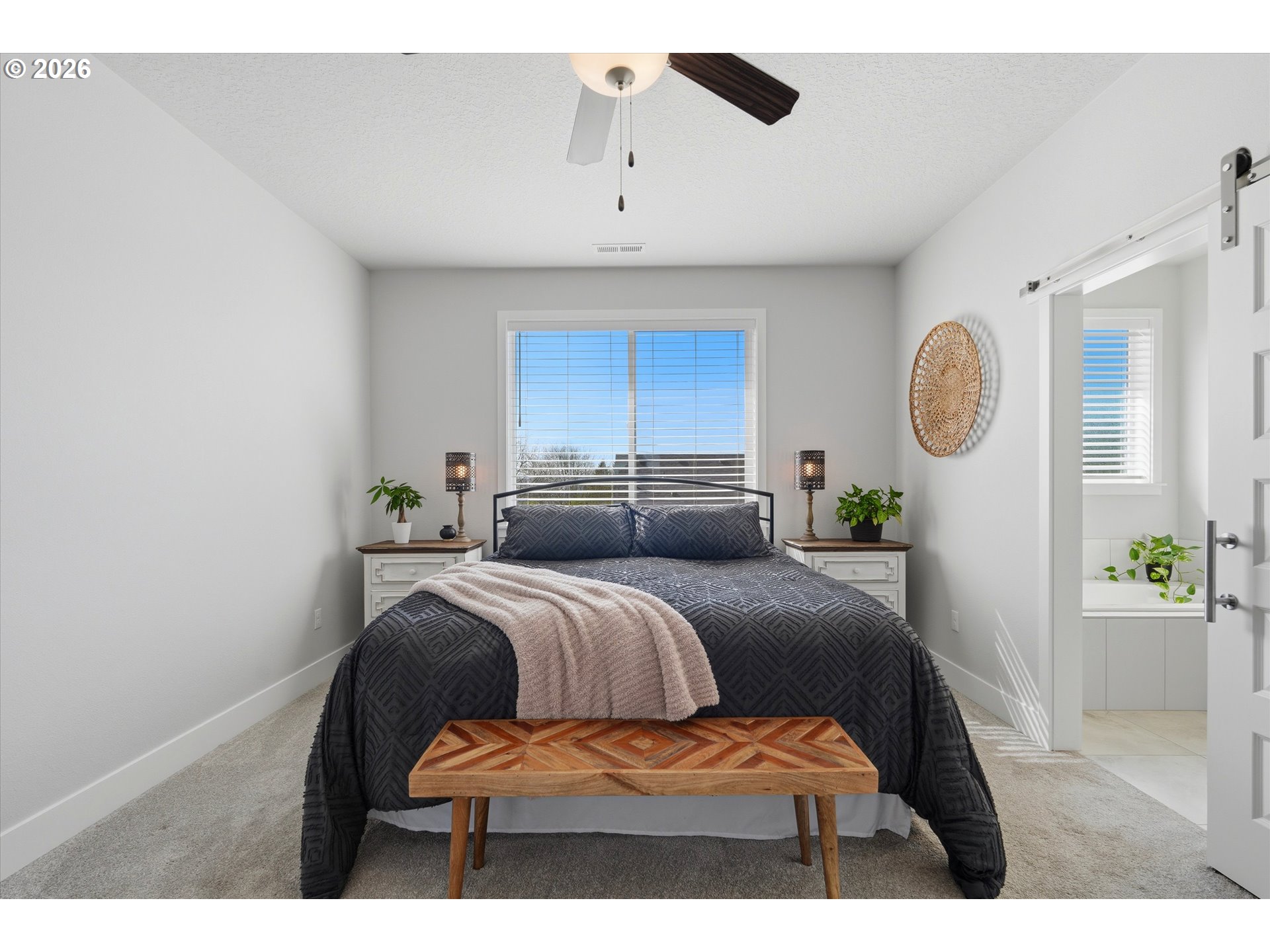 14589 Southwest Jensen Terrace Portland, OR 97224 - Photo 25 of 42 a bedroom with a bed and window