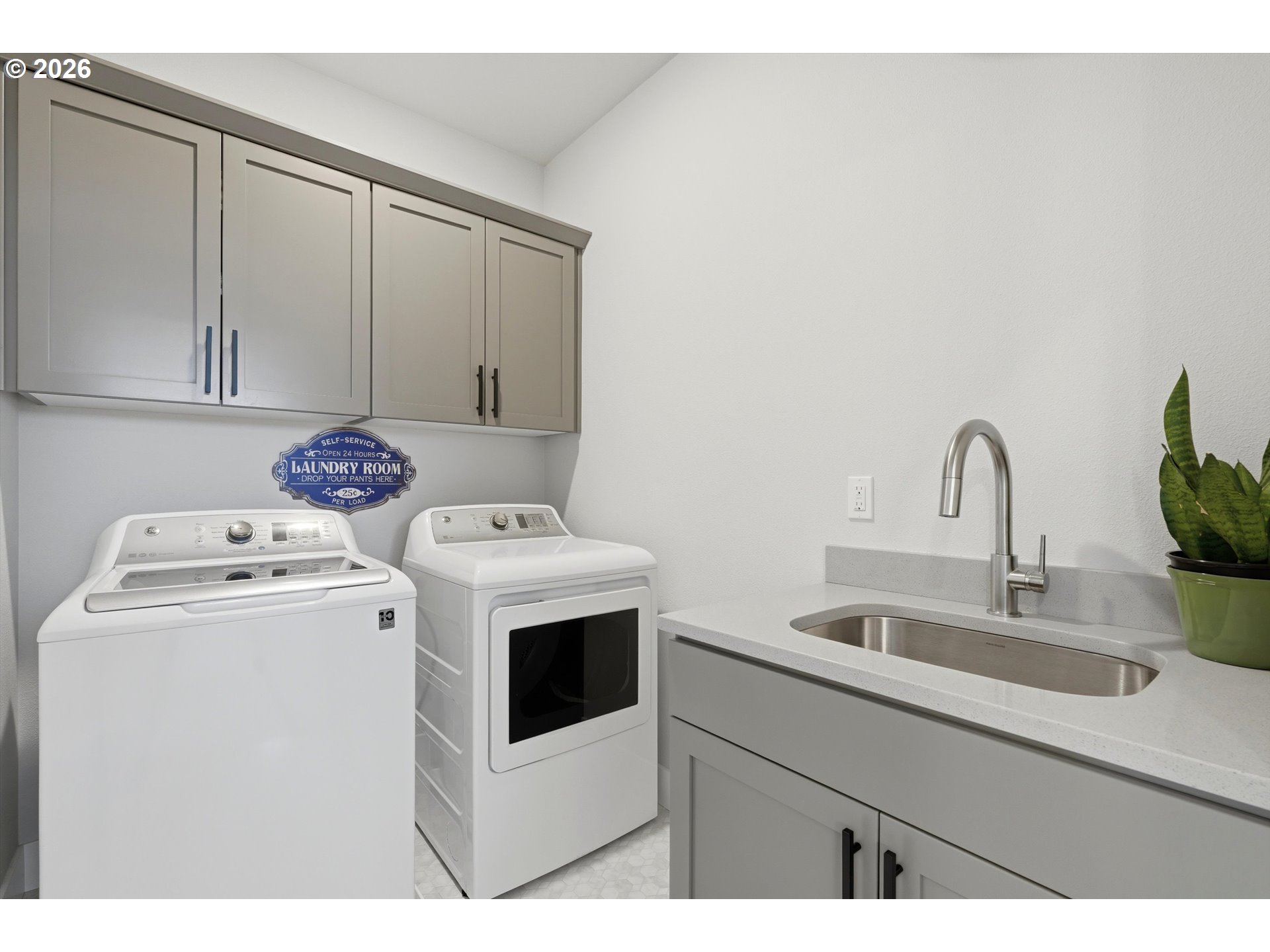 14589 Southwest Jensen Terrace Portland, OR 97224 - Photo 34 of 42 a utility room with dryer and washer
