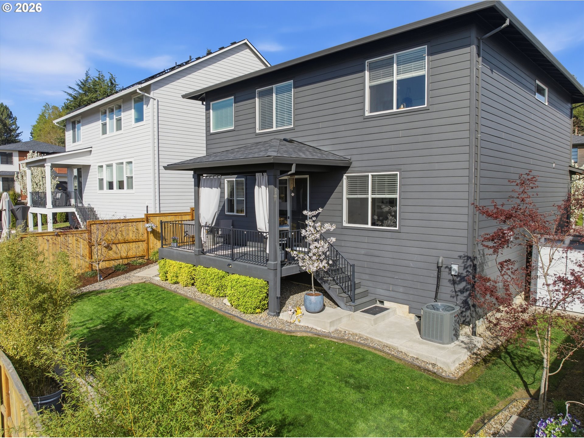 14589 Southwest Jensen Terrace Portland, OR 97224 - Photo 41 of 42 a house view with a outdoor seating and garden