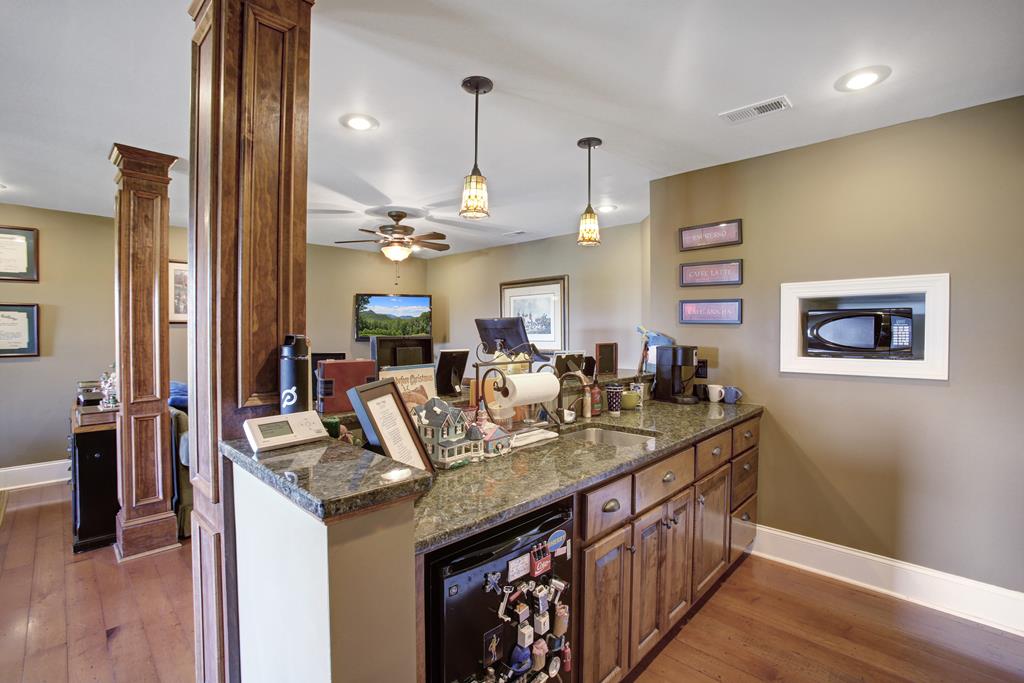 2899 Gribble Edwards Road Hayesville, NC 28904 - Photo 44 of 65 Main floor master sunroom/mini-kitchen