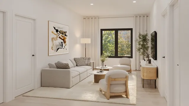 a living room with furniture and a large window