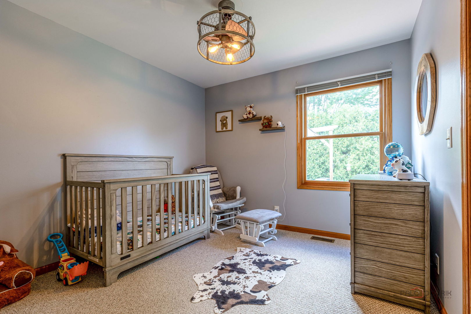 807 Aspen Way Genoa, IL 60135 - Photo 15 of 29 a bedroom with a bed and a window