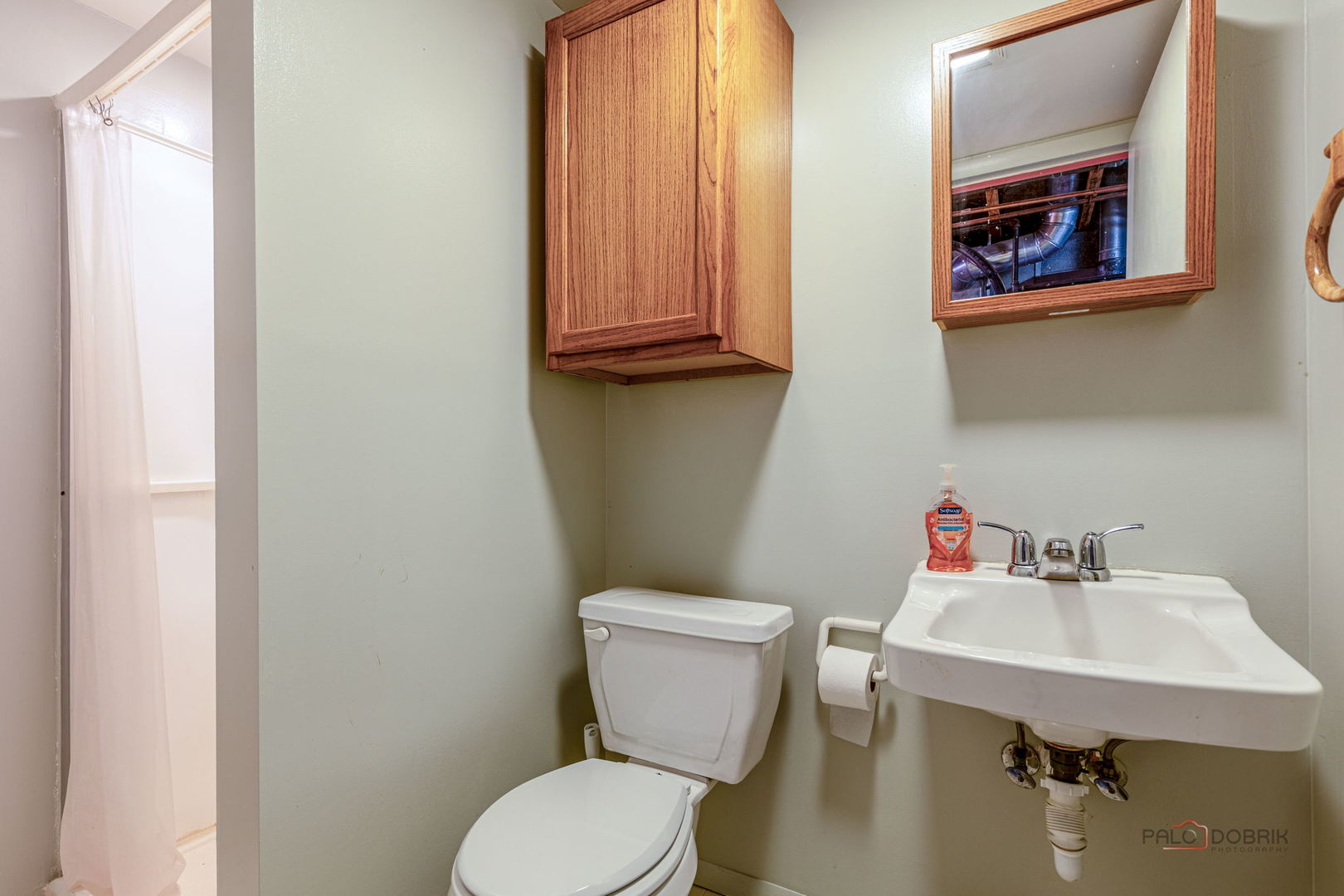 807 Aspen Way Genoa, IL 60135 - Photo 22 of 29 a bathroom with a toilet sink and mirror