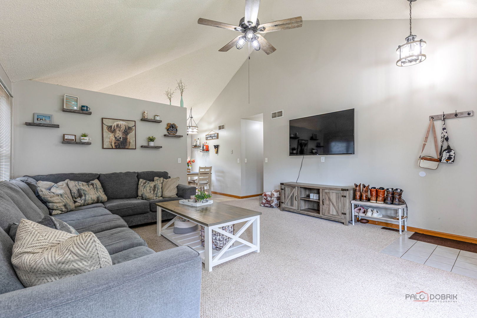 807 Aspen Way Genoa, IL 60135 - Photo 4 of 29 a living room with furniture and a flat screen tv