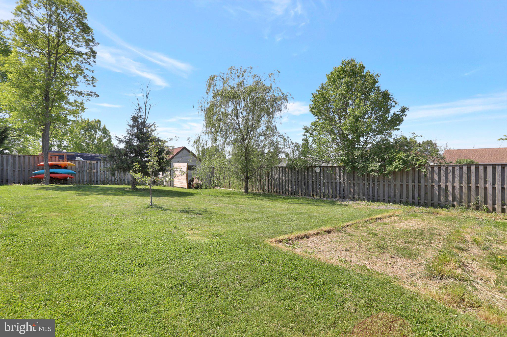 44 Harding Lane Inwood, WV 25428 - Photo 7 of 27 Full shadowbox privacy fencing around back yard