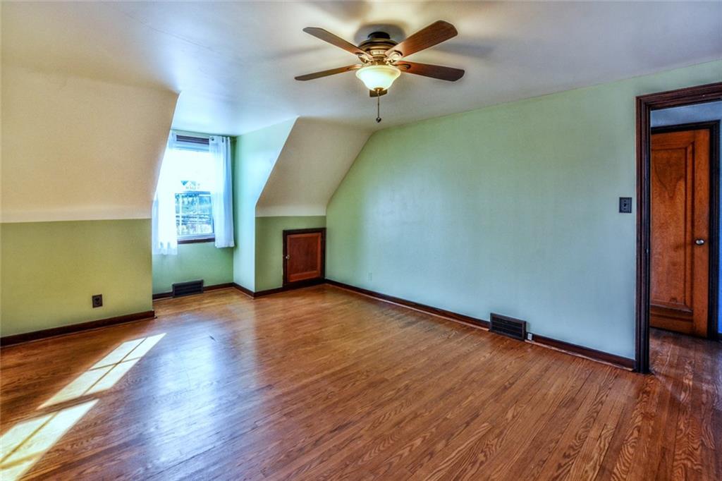 125 Gass Road Pittsburgh, PA 15229 - Photo 14 of 19 Spacious master bedroom with hardwood flooring!