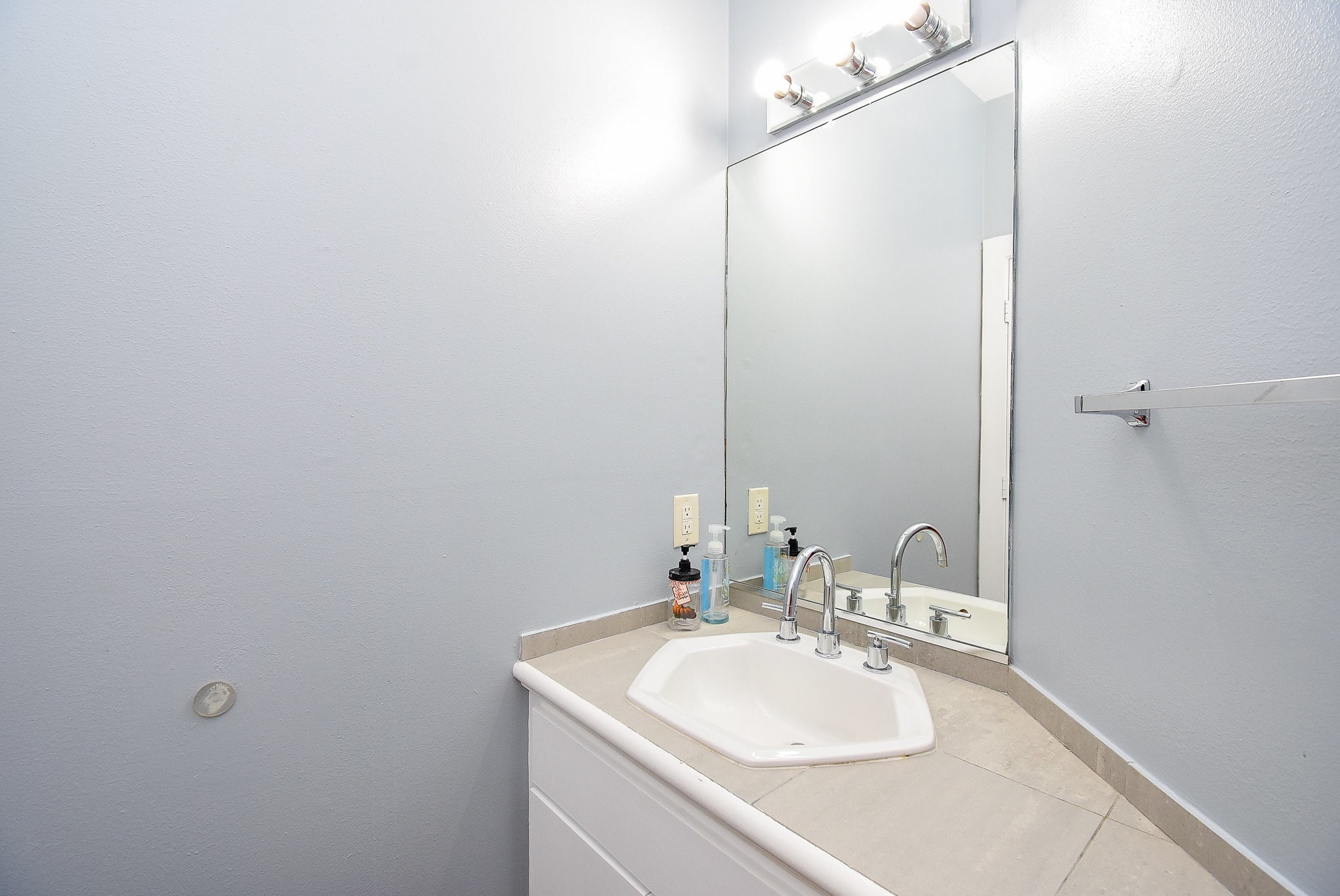 3720 Link Valley Houston, TX 77025 - Photo 13 of 25 a bathroom with a sink and a mirror