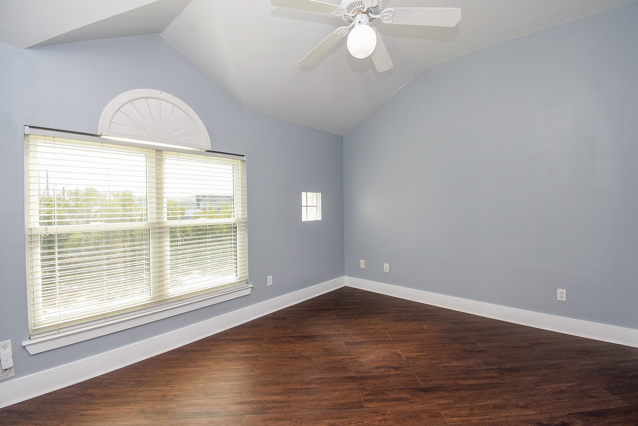 3720 Link Valley Houston, TX 77025 - Photo 17 of 25 a view of an empty room with wooden floor and a window