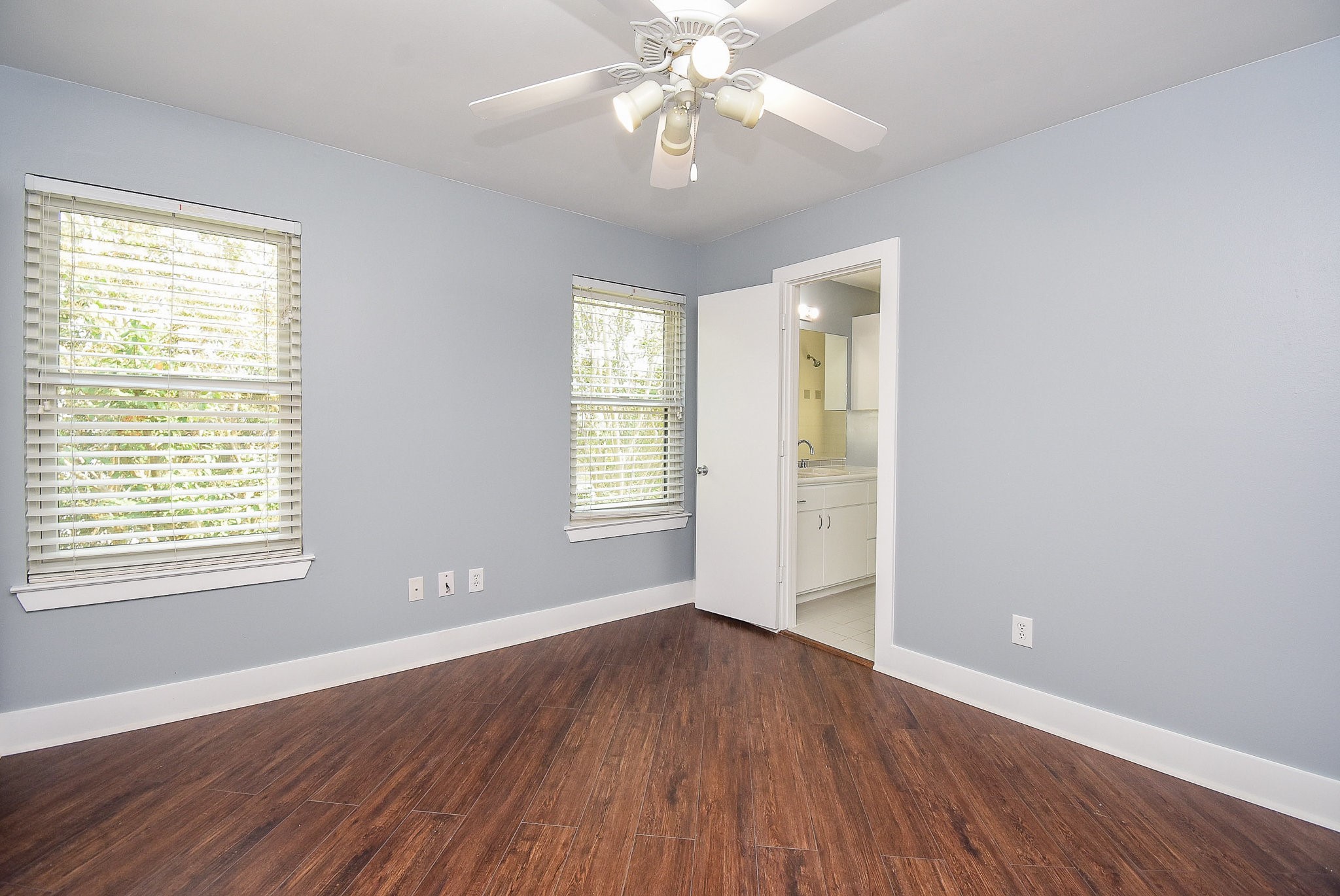 3720 Link Valley Houston, TX 77025 - Photo 19 of 25 a view of an empty room with wooden floor and a window