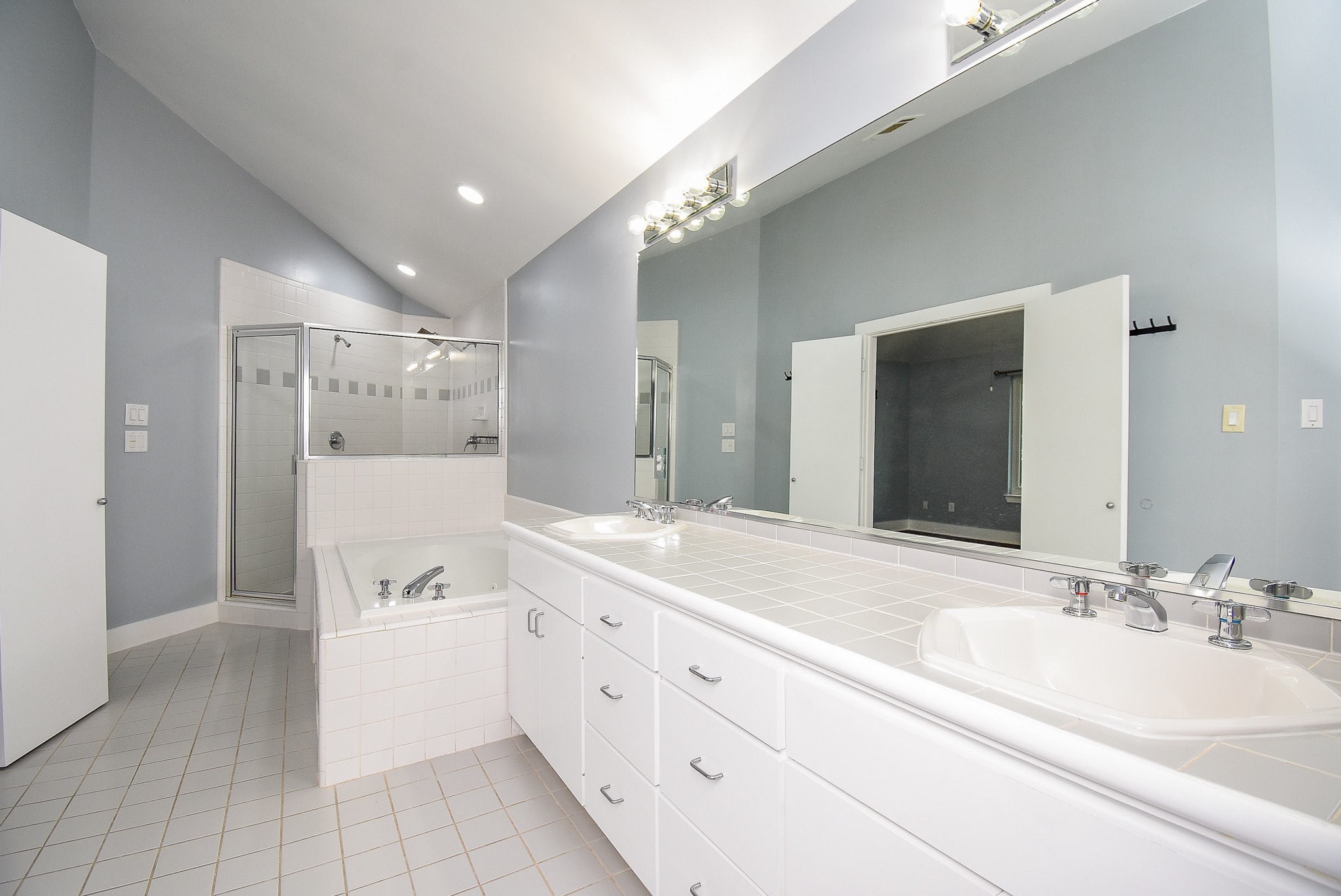 3720 Link Valley Houston, TX 77025 - Photo 22 of 25 a spacious bathroom with a double vanity sink mirror and double