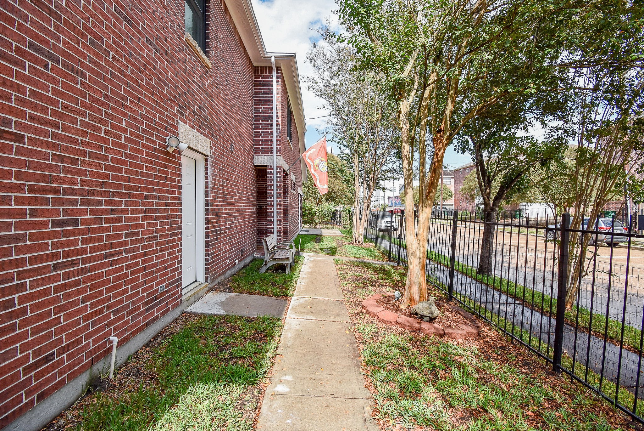 3720 Link Valley Houston, TX 77025 - Photo 25 of 25 a view of a pathway with a wrought fence