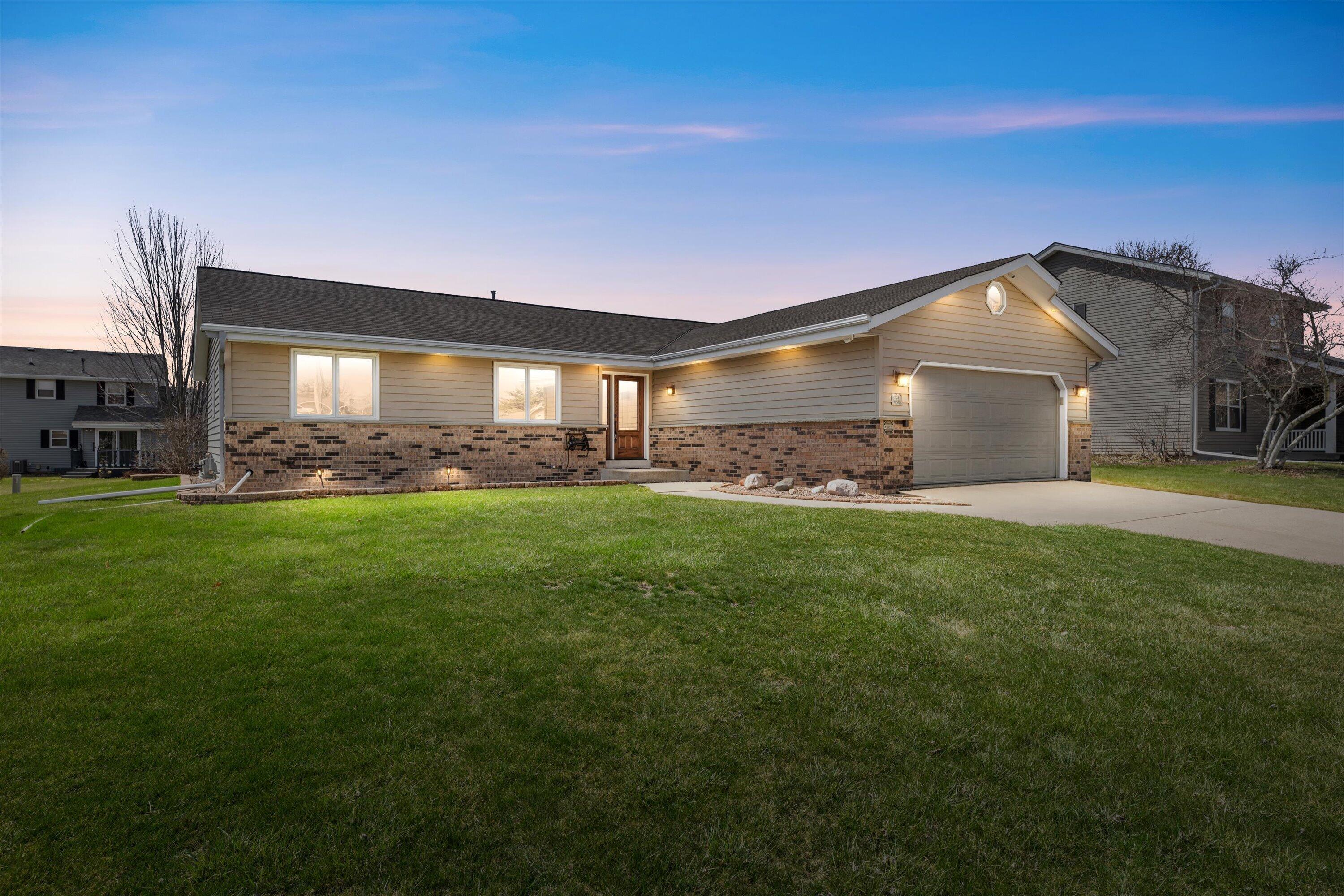 N78W15339 Haymeadow Road Menomonee Falls, WI 53051 - Photo 2 of 50 Twilight Image