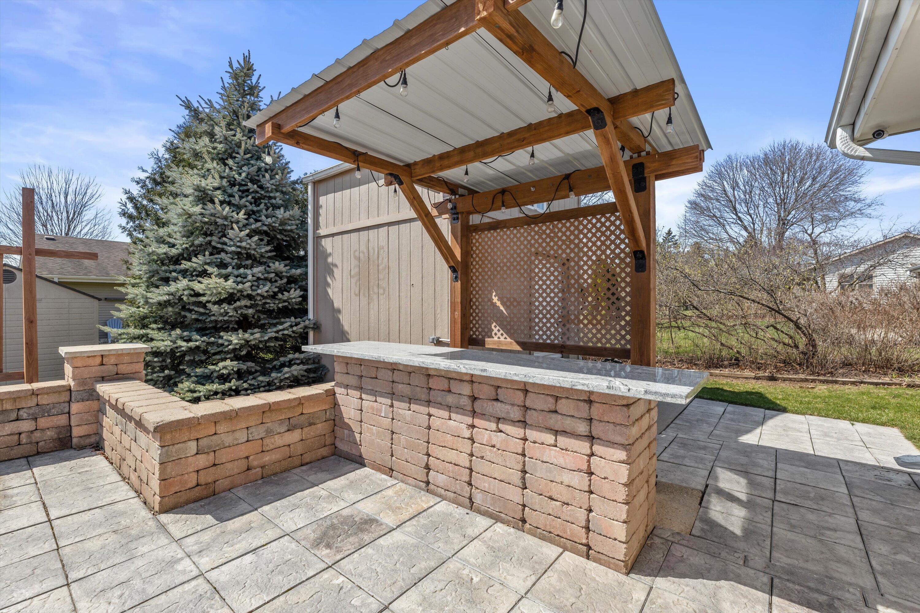N78W15339 Haymeadow Road Menomonee Falls, WI 53051 - Photo 47 of 50 Outdoor Kitchen Space